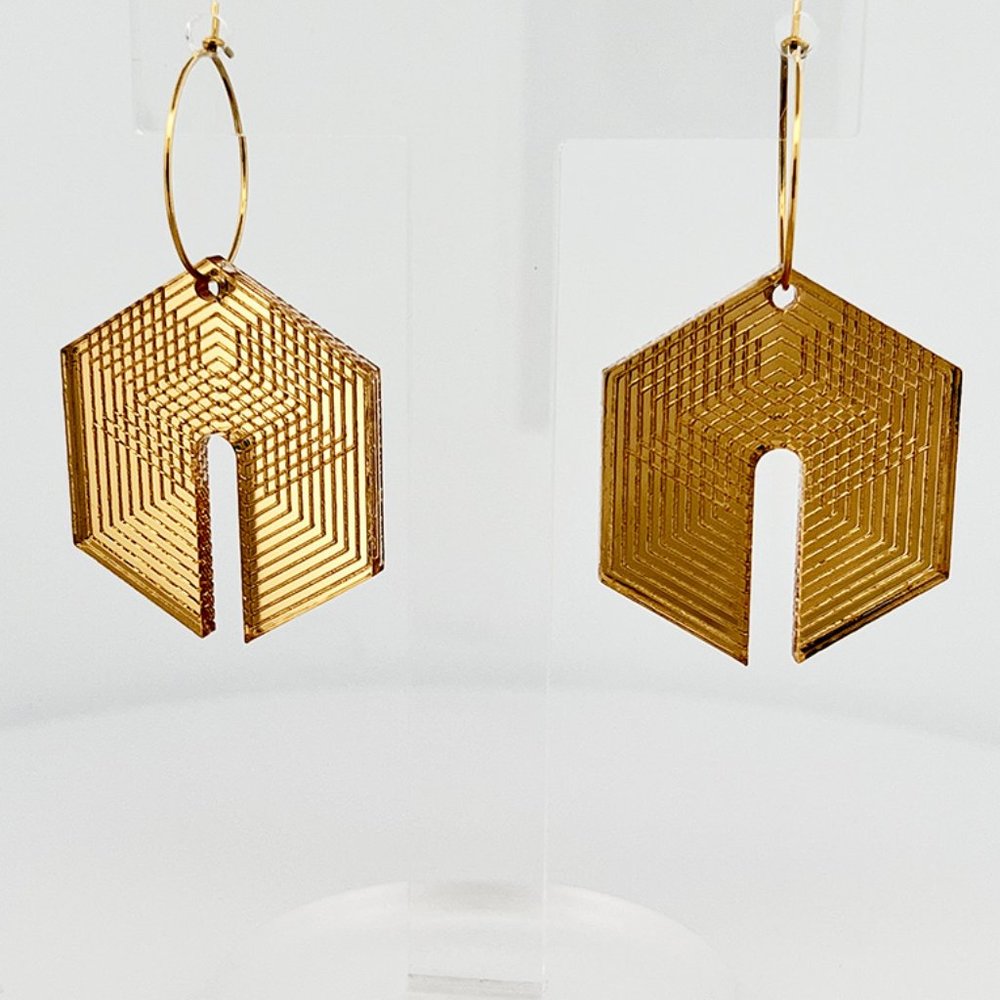 Gold Acrylic Geometric earrings with small rings.
